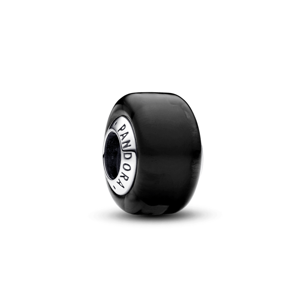 A miniature amulet made of black Murano glass