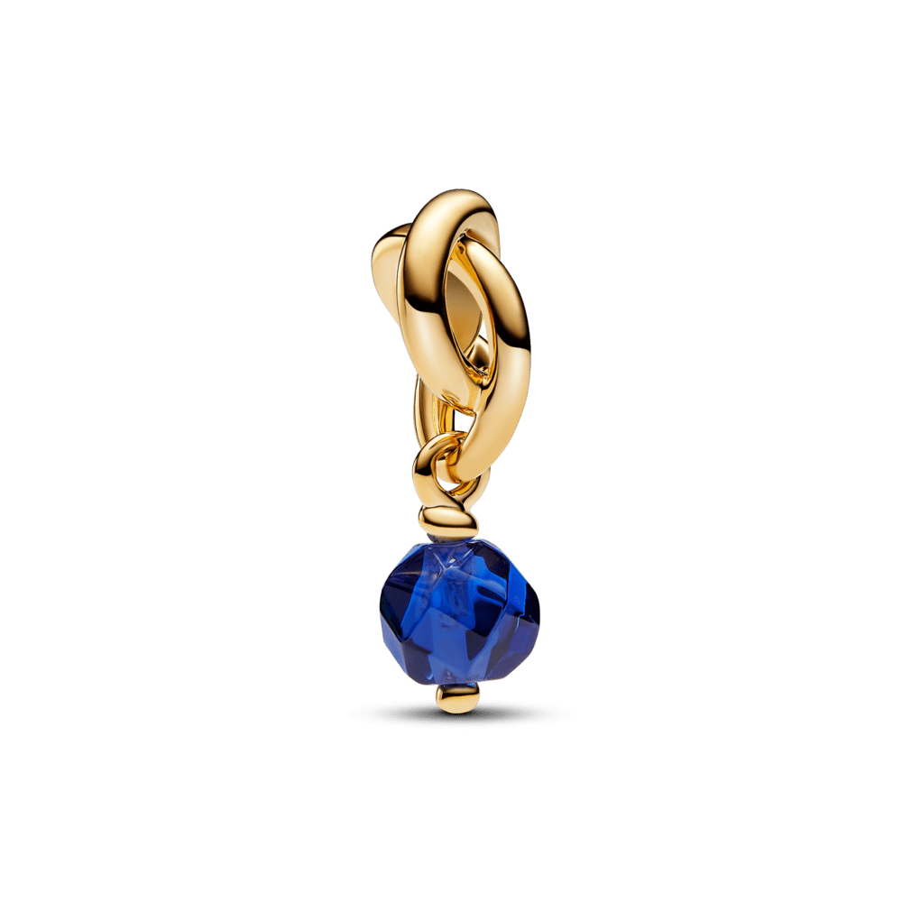 Faceted pendant with blue infinity symbol